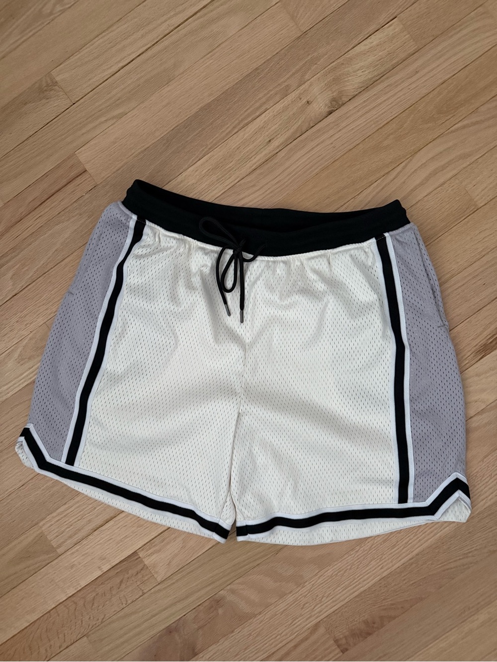 Like new John Elliott Men's Mesh Athletic Shorts in White with Gray Panels